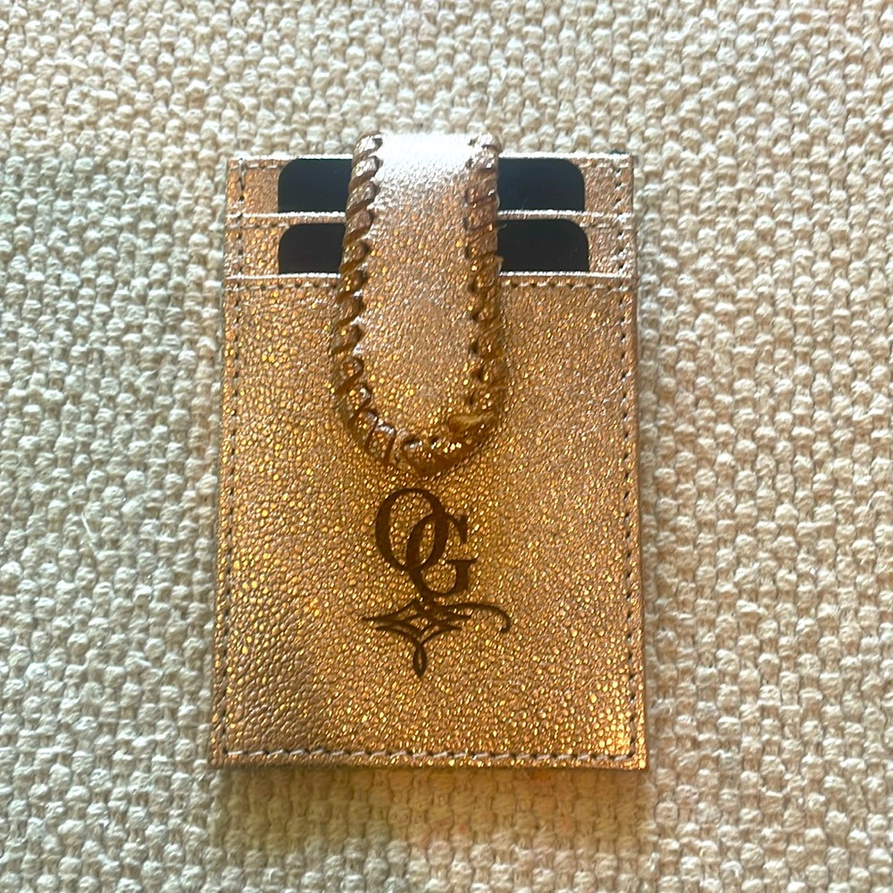 Old Gringo card holder. New. Gold leather. Magnetic closure.